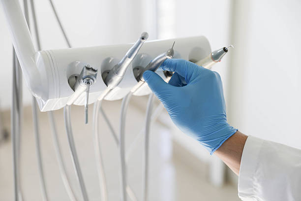 Professional Tooth Extraction technician working in Center Point, IA